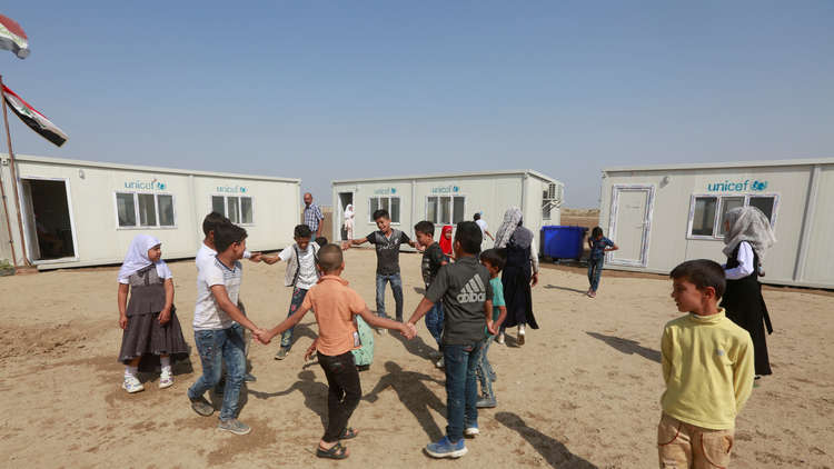 العراق.. أطفال "الكاولية" يعودون للدراسة