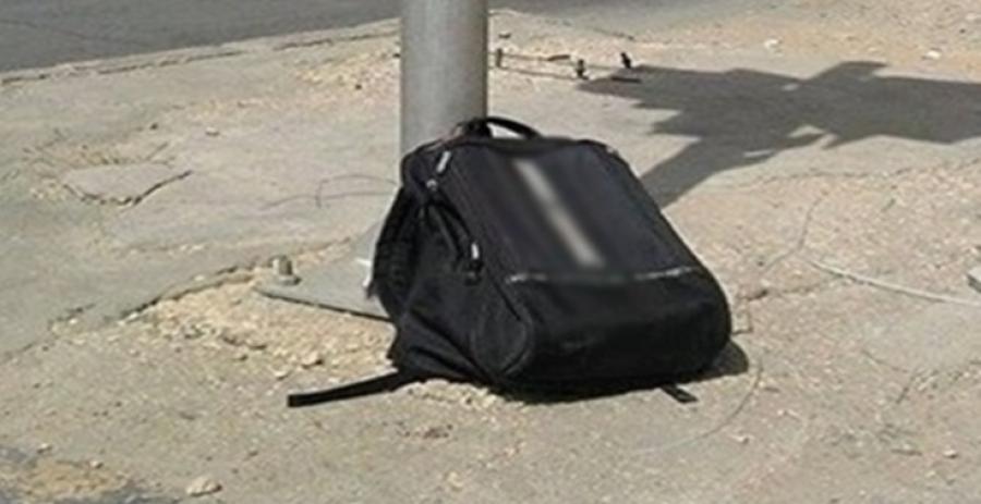 بلاغ عن حقيبة مشبوهة في ساحة ترابية بعمان